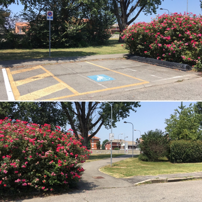 parcheggio riservato a portatori di handicap con rampa che porta in biblioteca